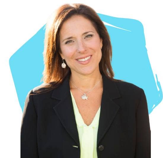 JoAnn Neale, Board Director, in front of a light teal hexagon.